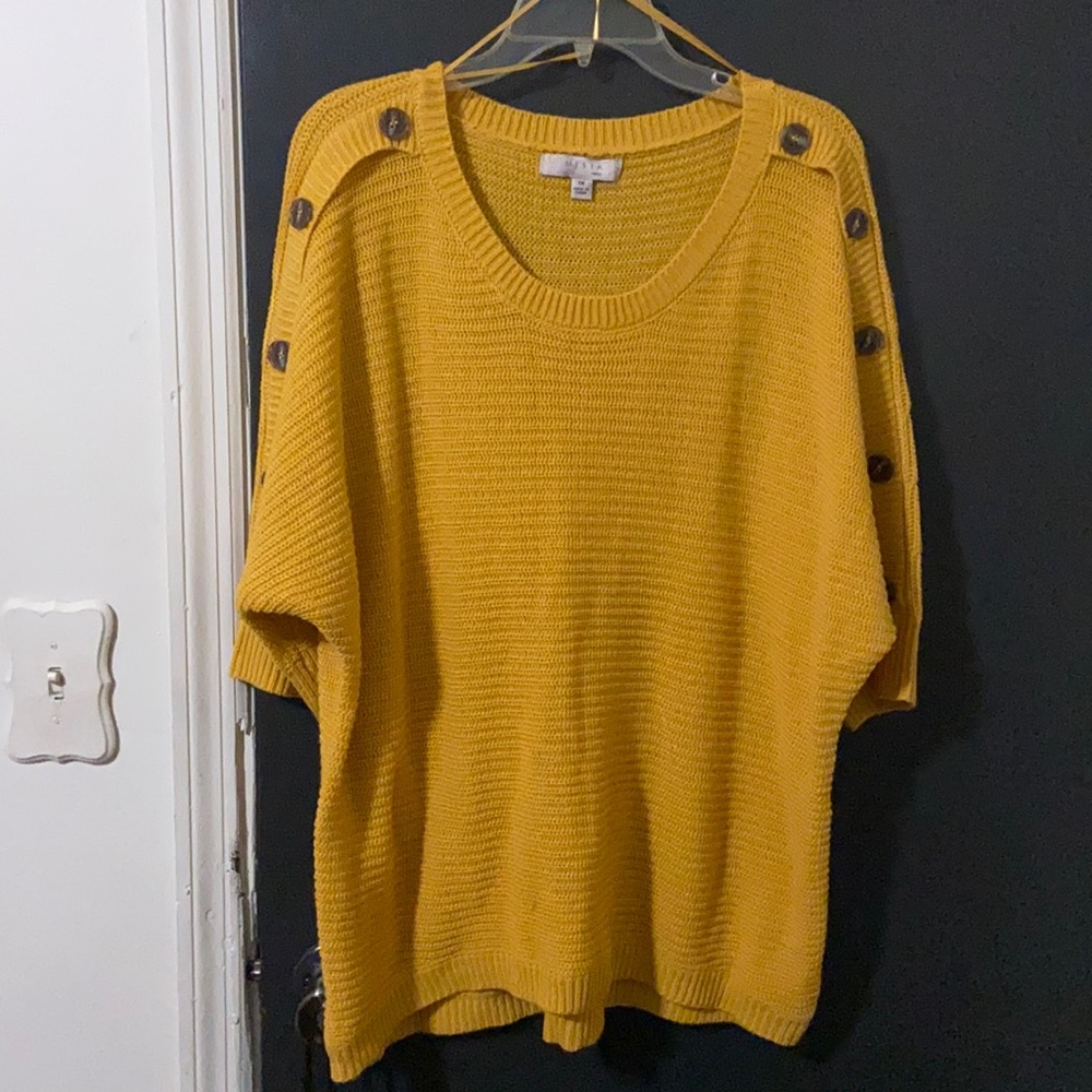 woman’s knitted sweater